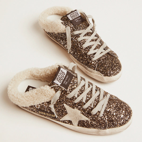 GOLDEN GOOSE SUPER STAR SABOT SNEAKERS IN BLACK & GOLD WITH SHEARLING LINING
